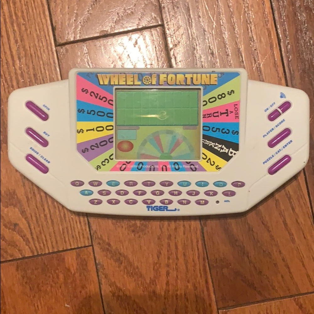 Wheel of fortune 1995 tiger hand held game